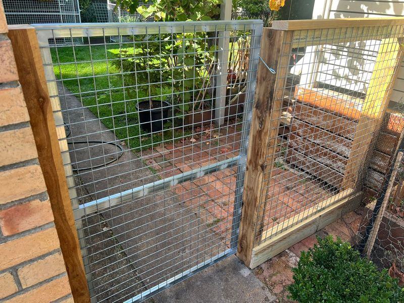 Weldmesh gate in a timber frame, garden enclosure