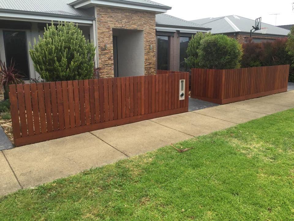 Merbau front fence with planter box returns on a modern Geelong home