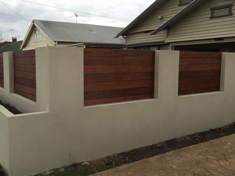 Rendered wall with horizontal timber infill panels